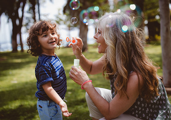 Boy blowing bubbles