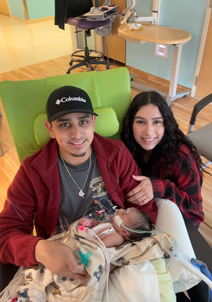 Rebecca Velazquez  and boyfriend Fernando hold their new son, Jeremiah at CHRISTUS Children's